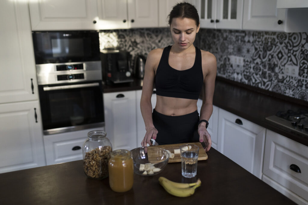 high angle sporty woman preparing healthy meal (1)