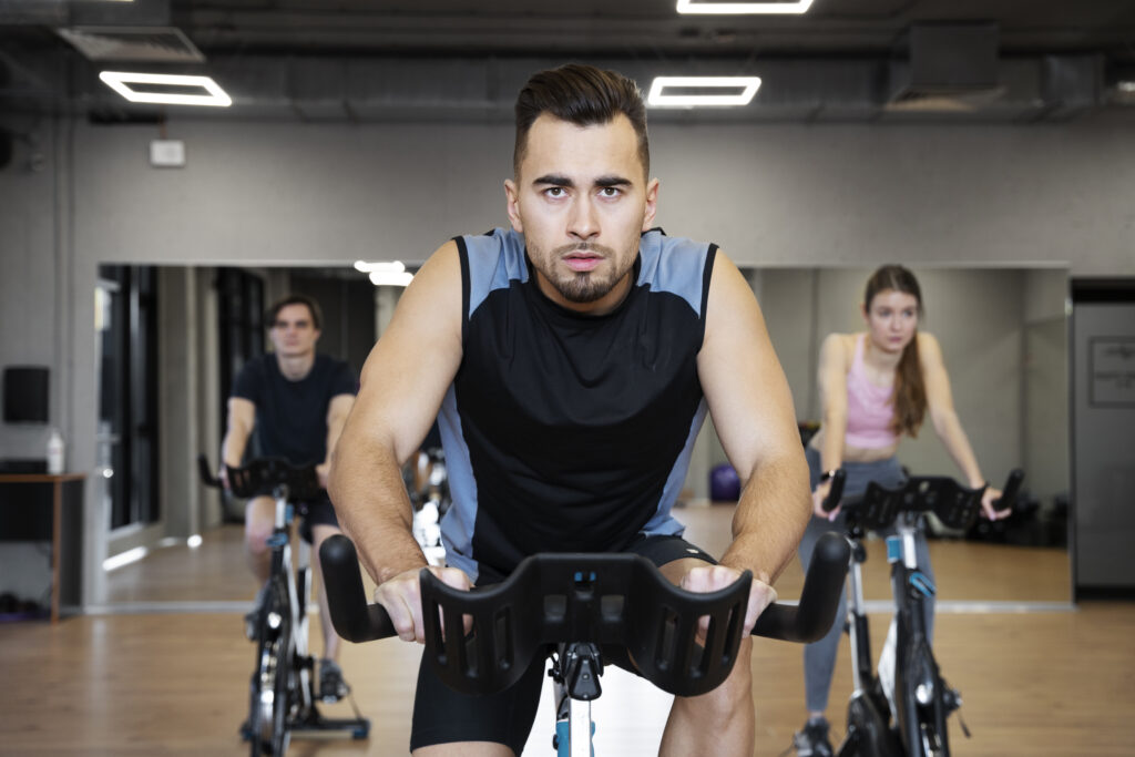 people doing indoor cycling